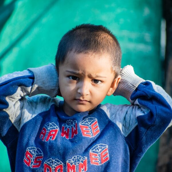 boy in blue and red hoodie